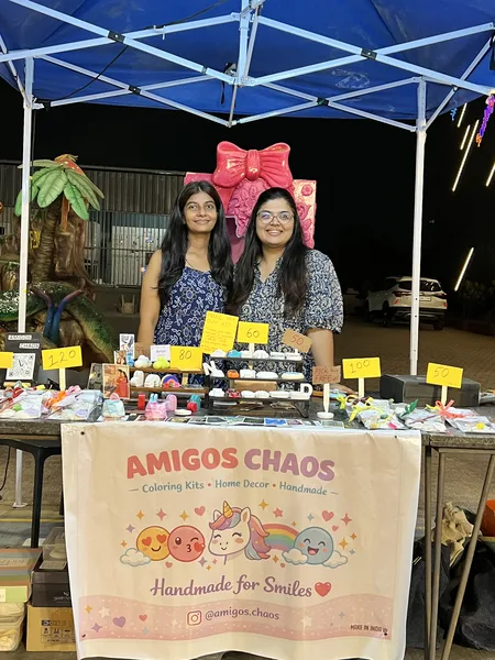 The Amigos Chaos founders at their pop-up stall in Ahmedabad