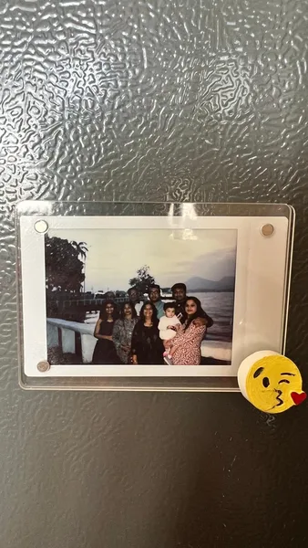 Polaroid photo in acrylic magnetic frame with hand-painted emoji magnet